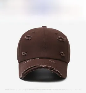 Detailed front view of a distressed dark brown vintage washed denim baseball cap