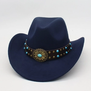Detail of navy wool cowboy hat featuring turquoise studs and floral metal buckle