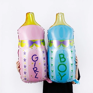 Large pink and blue baby bottle balloons for gender reveal and baby shower parties