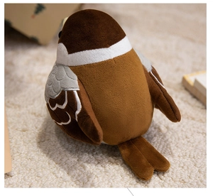 Detailed view of sparrow plush toy showcasing lifelike brown feathers on a soft rug