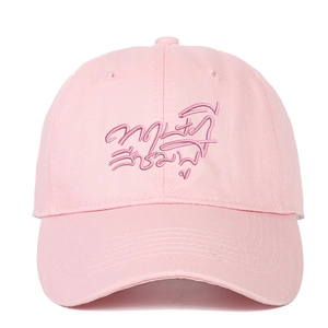Pink washed cotton baseball cap featuring embroidered Thai text on the front view