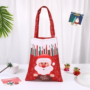 Red Christmas Santa Claus canvas gift bag with Warm Wishes print and holiday decorations