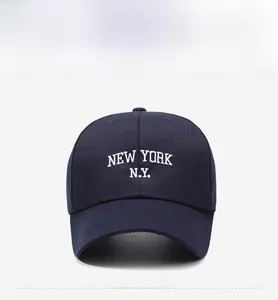 Detailed front view of navy blue cotton baseball cap with white New York embroidery