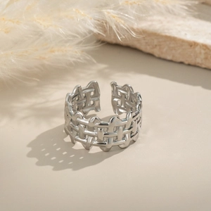Silver geometric woven stainless steel open ring with a textured grid design and metallic finish