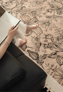 Detailed texture of retro floral carpet with hand-drawn sunflower patterns in warm beige tones