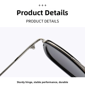 Detailed view of durable silver metal hinge and black frame construction of sunglasses