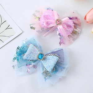 Sparkling mesh bow hair clips with sequins and crystals for girls in pink and blue