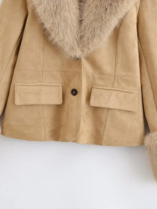 Detail of camel faux suede blazer featuring a detachable plush faux fur collar and pocket