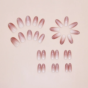 Detail view of plum gradient cat-eye press-on nails with shimmering magnetic powder texture