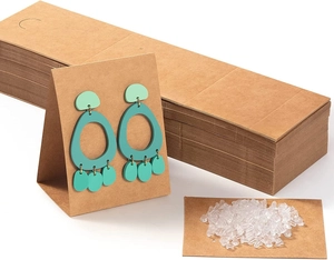 Brown kraft paper earring display cards set with silicone backings and turquoise studs