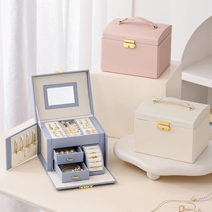 Three-layer faux leather jewelry box with drawers and side necklace storage hooks
