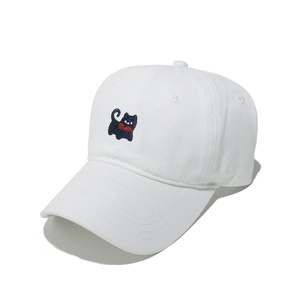 Close-up of white cotton baseball cap featuring detailed cute black cat embroidery