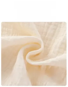 Close-up of Class A breathable cotton gauze fabric texture for baby summer rompers