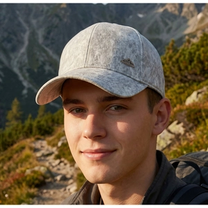 Outdoor close-up of grey marble texture baseball cap with mountain metal buckle detail