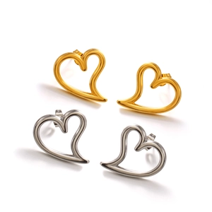 Pair of gold and silver hollow heart stud earrings in polished stainless steel finish