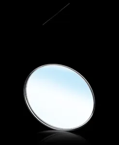 Macro shot of scratch-resistant round watch glass with clear blue-tinted transparency