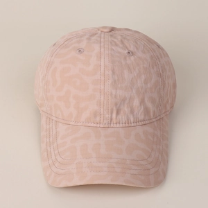 Top view of pink leopard print baseball cap featuring breathable eyelets and smooth fabric