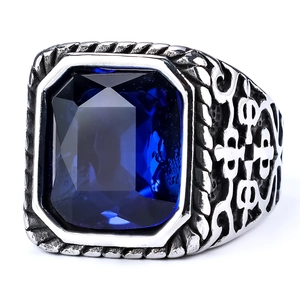 Vintage stainless steel ring for men with deep blue rectangular gemstone and ornate carvings