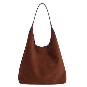 Vintage brown suede tote bag for women featuring a spacious and minimalist shoulder design