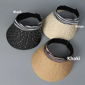 Detailed view of straw sun visors in black, beige, and khaki with rhinestone brim