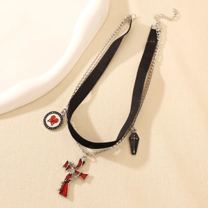 Gothic double layer choker featuring a skull red cross and coffin charms on black velvet