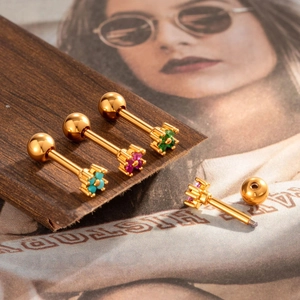 Floral cubic zirconia cartilage earrings in gold finish with colorful stones set in steel