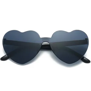 Trendy rimless heart-shaped sunglasses with dark gradient lenses for a stylish look