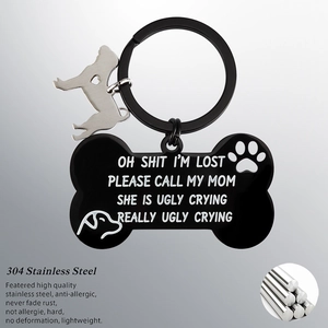 Customized black bone-shaped stainless steel dog tag with humorous engraving and charm