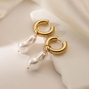 18K gold plated stainless steel hoop earrings with baroque pearls on white silk