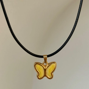 Vintage 18k gold plated titanium necklace with yellow butterfly pendant on black cord