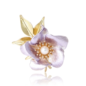 Elegant purple enamel narcissus flower brooch with pearl center and golden metal leaves