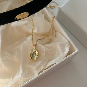 Minimalist 925 sterling silver gold plated necklace with a polished oval bead pendant