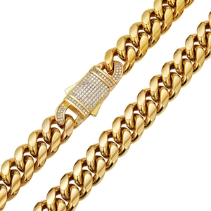 Detail of gold Cuban link chain showing a secure box clasp pavé-set with sparkling zircons
