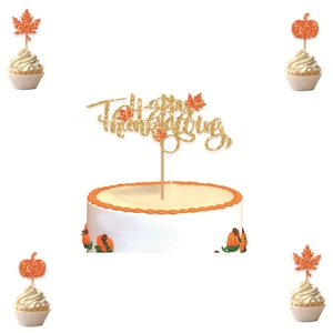 Golden glittery Happy Thanksgiving cake toppers with maple leaf and pumpkin decorations