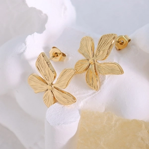 Exaggerated golden textured petal stud earrings in 18k gold-plated stainless steel