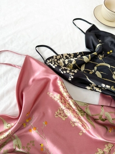 Detailed view of floral silk satin camisole set with thin straps in pink and black