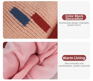 Detail of kids winter knit hat with colorful blocks and soft plush warm lining