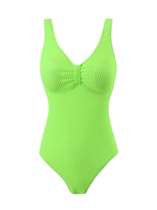Détail du maillot de bain une pièce vert fluo avec tissu texturé et décolleté en V