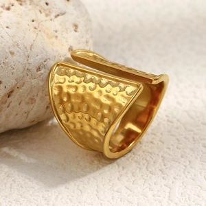 Detail view of 18K gold plated stainless steel wide ring with hammered texture finish