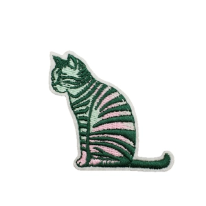 Embroidered green cat patch with floral pattern and iron-on backing for clothing