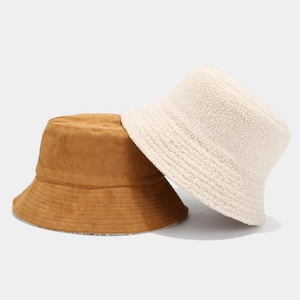 Winter reversible bucket hat featuring camel suede and creamy faux shearling textures
