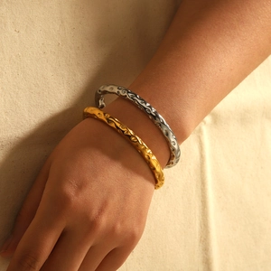Minimalist hammer textured stainless steel open C-shape bangles in gold and silver
