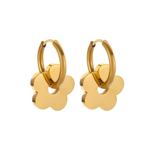 Elegant gold flower hoop earrings set with minimalist floral charms on white background