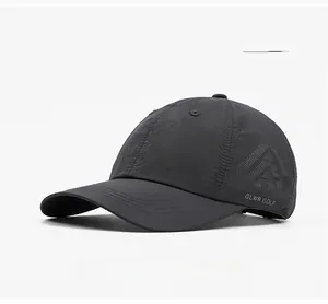 Close-up of quick-dry baseball cap with GLWR GOLF logo and breathable mesh pattern
