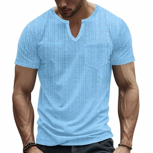 Close-up of waffle texture and chest pocket on light blue Henley V-neck t-shirt