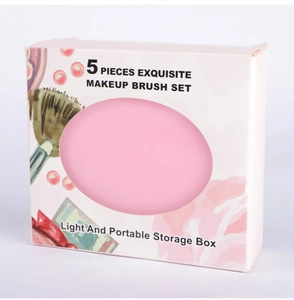 Detail of the portable 5-piece makeup brush set in a white case with pink floral accents