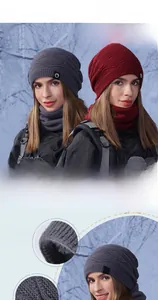 Close-up of the grey knit winter hat set with thick fleece lining and woven logo tag