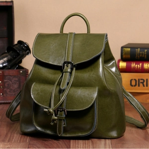 Olive green vintage oil wax leather backpack with drawstring closure and front pocket