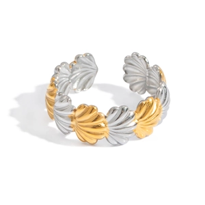 Two-tone gold and silver open bangle with shell texture relief and adjustable design