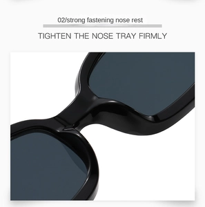 Detail view of the stable integrated nose rest on these stylish black square sunglasses